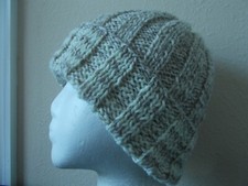 Hand knitted cozy and warm 100 wool hat, natural twist/white