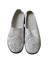 white leather moccasin slippers