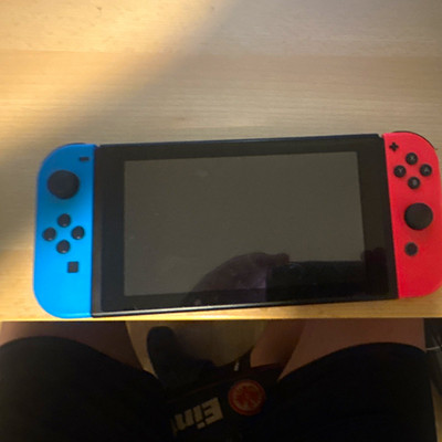 Nintendo Switch Handheld-System Konsole 32GB Rot/Blau PAL inkl. FIFA 23