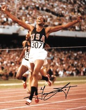 tommie smith beams with delight after winning gold 200m 1968 signed 10x8 photo