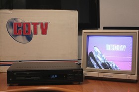 CCOMMODORE CDTV BOXED + CD-1221 KEYBOARD + CD-1253 MOUSE + GENLOCK 1301 LV4 91184