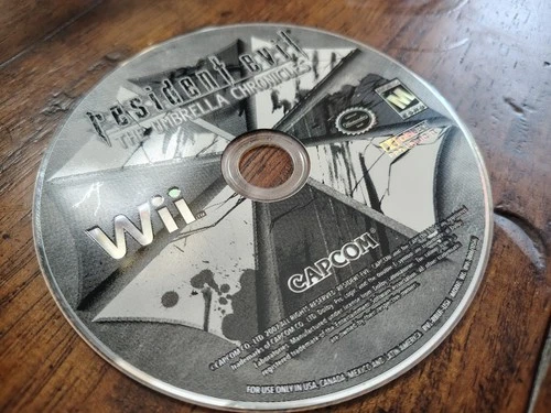 Resident Evil: The Umbrella Chronicles (Nintendo Wii, 2007) Disc Only