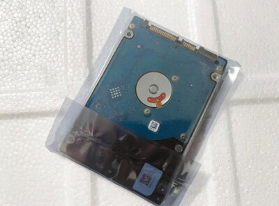 Seagate Laptop Thin SSHD w/ 8GB Nand 320GB SATA ST320LM002 1EJ16C