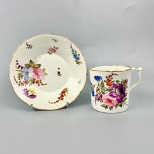Derby Porcelain coffee can & saucer. Moulded border. Petal rim. Red mark c1820