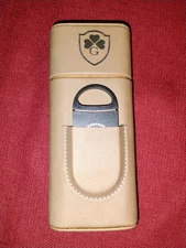 Tan cigar case, holds 3 & a cutter included, excellent condition, monogrammed G