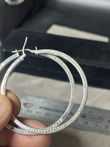 50mm sterling silver diamond cut earrings
