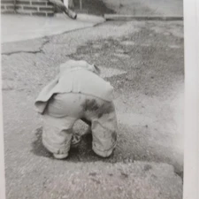 Photo Toddler Boy Playing in Water Puddle Getting Suit Dirty c1950s Vintage