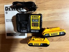 Two Dewalt DCB203 Batteries and DCB1104 charger