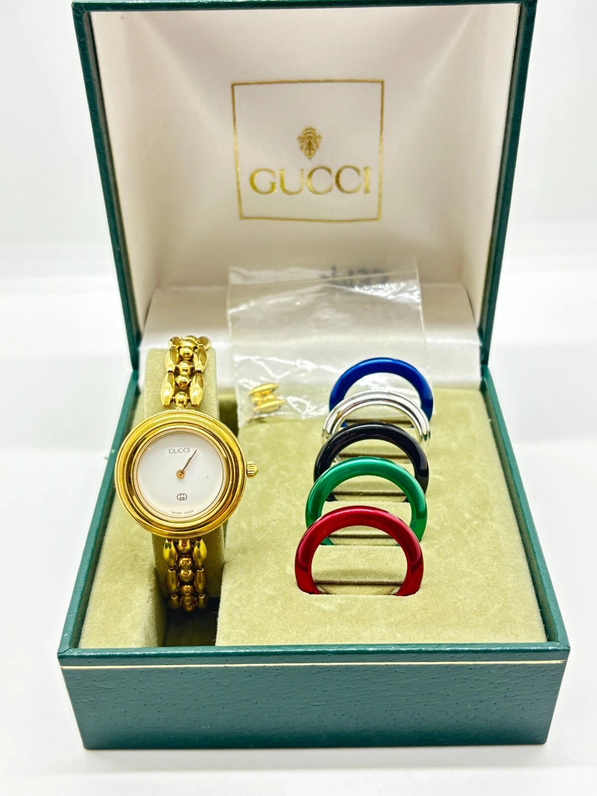 [Presque comme neuve avec boite] Montre GUCCI lunette changeante 11/12 6 couleurs or occasion fonctionne F/S