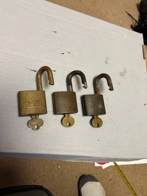 3 VINTAGE CORBIN BRASS HEAVY PADLOCKS . All Keyed alike with 3 keys. Working
