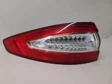 Used Left Tail Light Assembly fits: 2016 Ford Fusion quarter panel mounted LED H