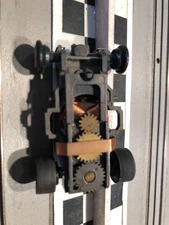 HO slot car, AFX magnatraction chas, stock red tip 14-ohm armature, 14.06 MPH.