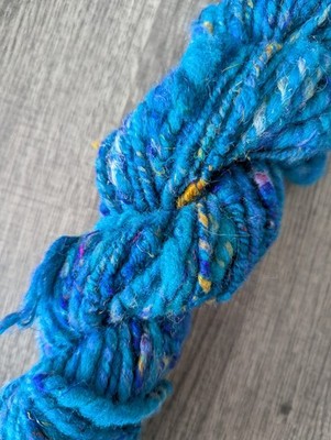Hand spun art yarn textured bulky blue tonal Saori weave knit crochet felt craft