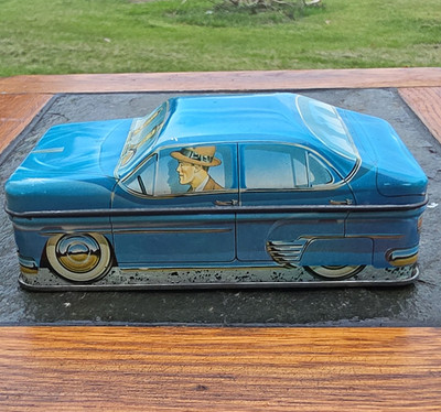 Ian Logan's Carlectables 1982 Blue Car-Shaped Advertising Tin Collectible