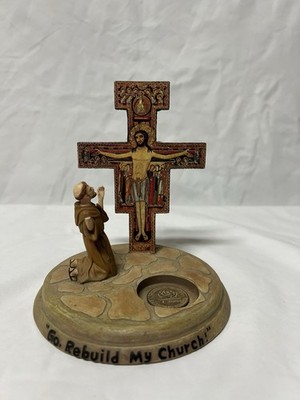 St. Francis while he was praying before the San Damiano Crucifix