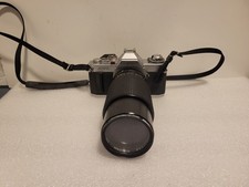 Canon AV 1 camera with lens