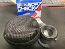 Photographic Solutions Sensor Check in box with paperwork