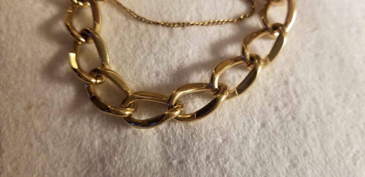 Vintage Monet gold tone chain link bracelet with safety