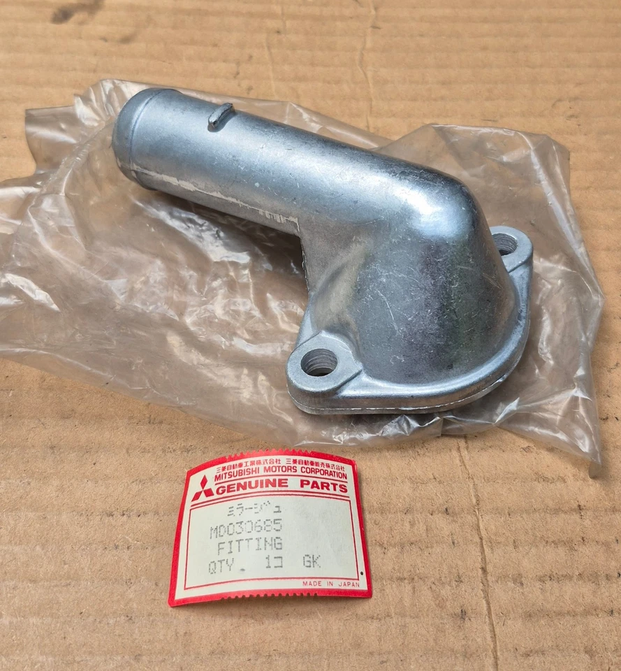 1980-1986 Dodge Colt Plymouth Champ 1.4L 1.5L NOS Mitsubishi THERMOSTAT HOUSING - Image 2 of 3