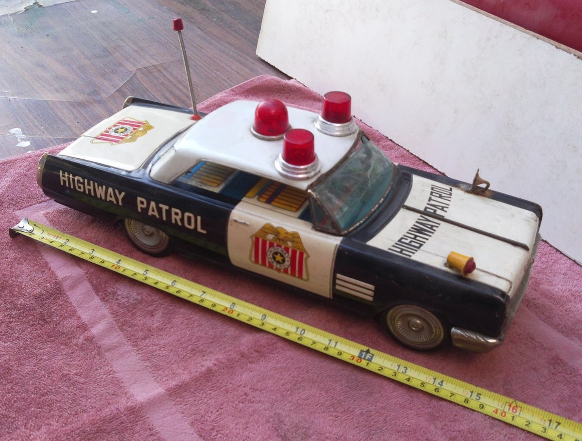 Vintage Tin Toy Car.. Battery Operated Bump'N'Go (15 Inch) Police