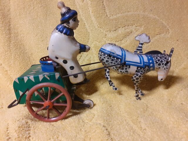 blechspielzeug antikspielzeug Clown mit Kutsche und Pferd