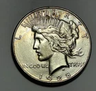 1928 S  PEACE DOLLAR AU+ DETAILS
