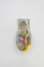 Boy on Scooter Vintage Tin Litho Clicker Noisemaker