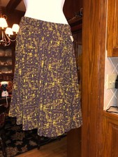 NWT LULAROE Comfy Elastic waist Pleated Skirt Black W/ Gold Print XS