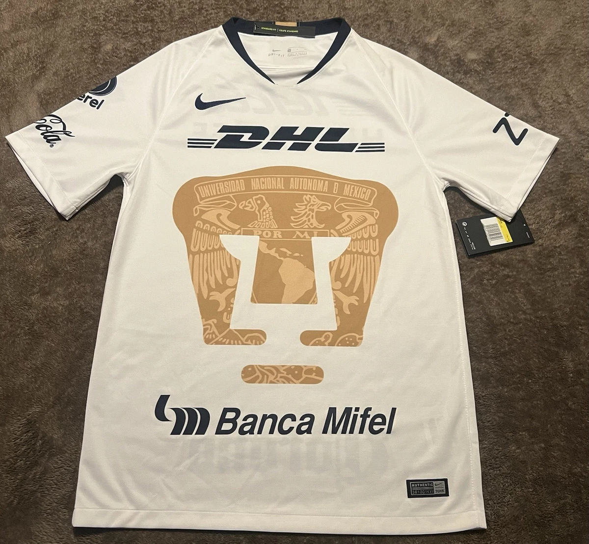 Preços baixos em Nike pumas unam Camisas de futebol da Equipe