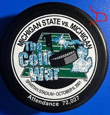 Vintage Michigan State Vs Univ. Of Michigan (Cold War) Souvenir Puck 10/06/200
