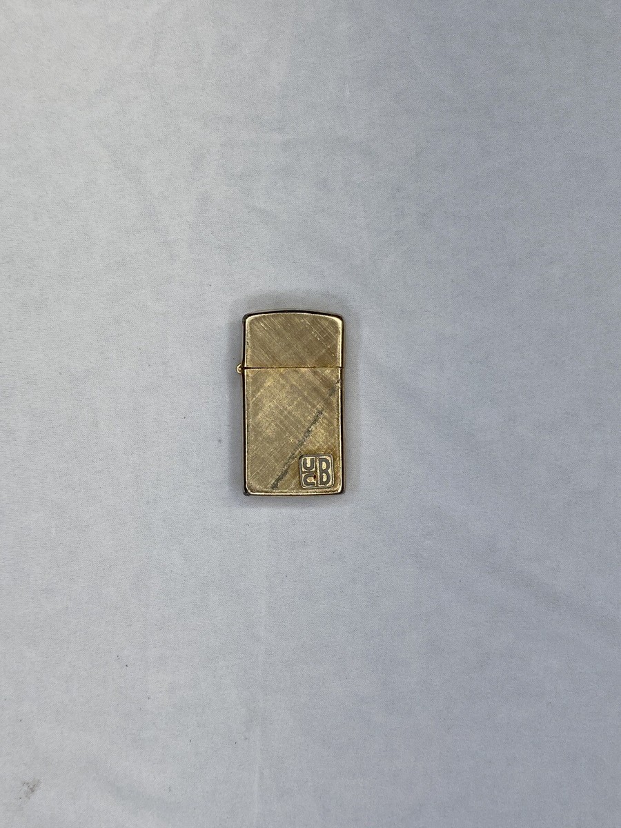 Vintage Impact 14 Kt Gold Plated Slim Made In USA Lighter “UCB”