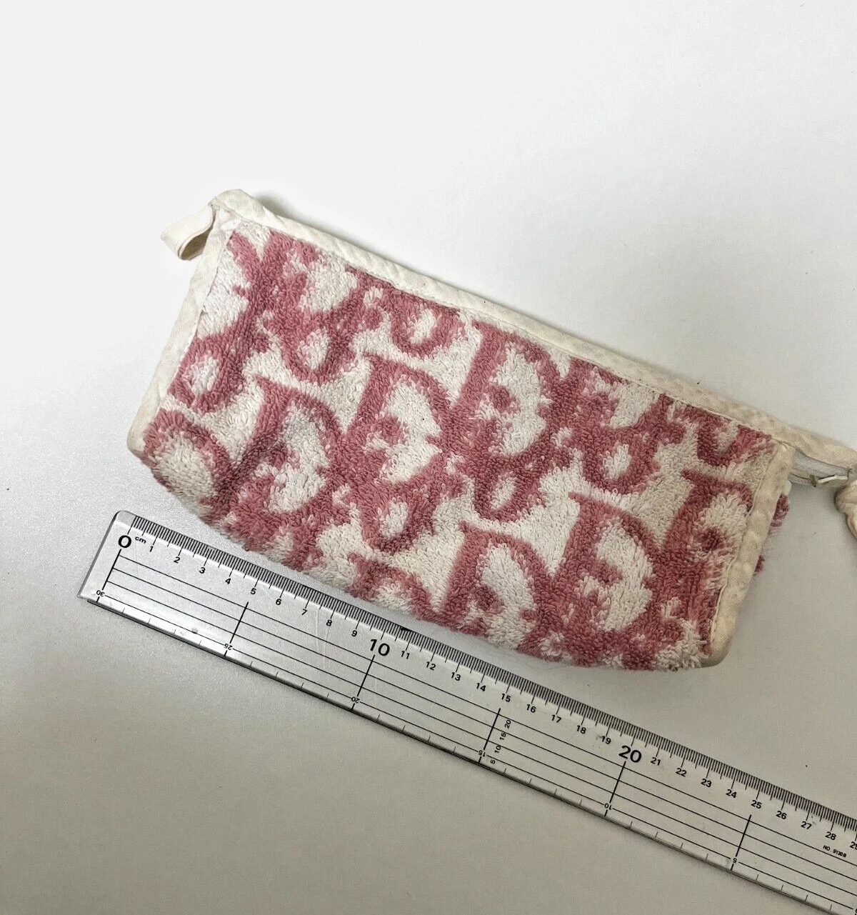 Pochette pochette tissu serviette éponge Christian Dior rose monogramme logo trotteur