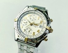 Offered for sale is a Breitling Chronomat B13050.1, featuring a classic white di
