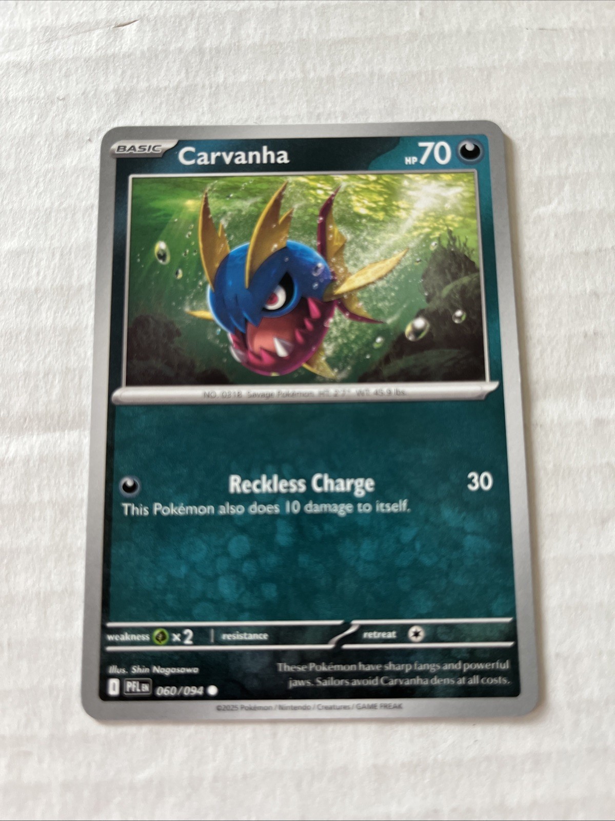 Carvanha 060/094 Me02: Phantasmal Flames Regular