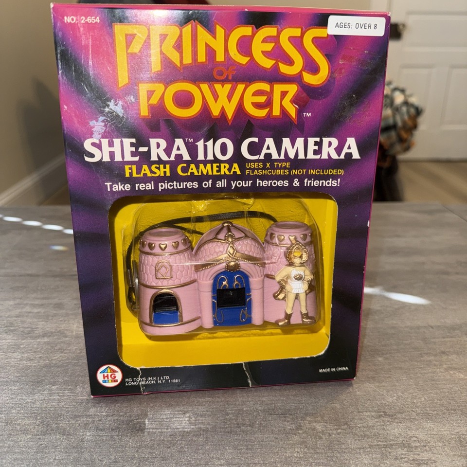 A 1985 She-Ra 110 film camera, never opened, still in the box — an absurdly rare MOTU artifact that doubles as a pop-culture trophy.