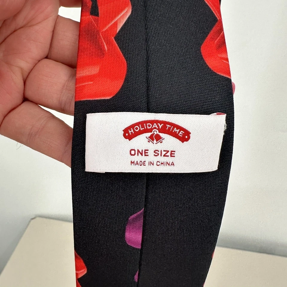 Corbata navideña tejida estampada negra con lazos sello Navidad Foto 2 de 4