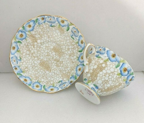 FOR SALE A VINTAGE TEA CUP AND SAUCER GOLD TRIM AND BEAUTIFUL FLOWERS -- Antique Price Guide