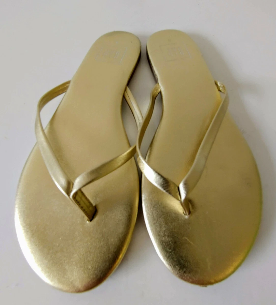 Gap gold flip best sale flops