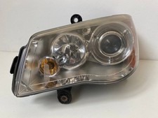Faro sinistro XENON Chrysler Voyager 2008-2016 05113339AD 11335