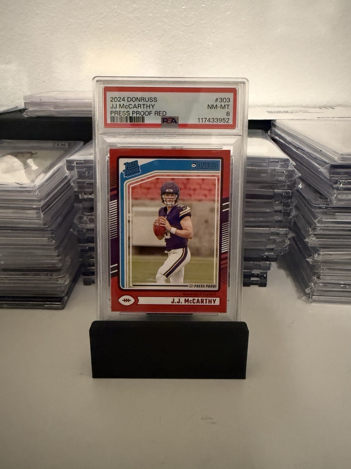 2024 Panini Donruss Rated Rookie J.J. McCarthy #303 Press Proof Red PSA 8