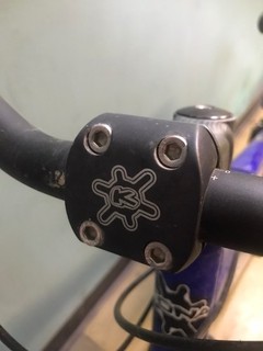 retro black kona mtb stem.