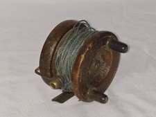 SMALL EARLY BRASS FITTINGSSTRAP BACK 3 INCH WOODEN NOTTINGHAM FISHING REEL.