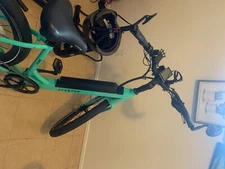 Aventon Pace 500 Step-Thru Electric Bike, Celeste color, 107 miles