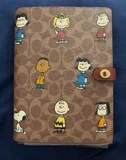 Coach X Peanuts Notebook In Signature Canvas with snoopy