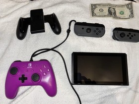 Nintendo Switch with 3 Games,  A Second Controller, A 256GB SD card