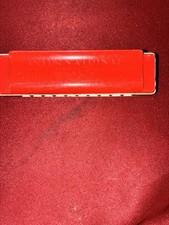 vintage International Harmonica, a plastic toy or beginner instrument