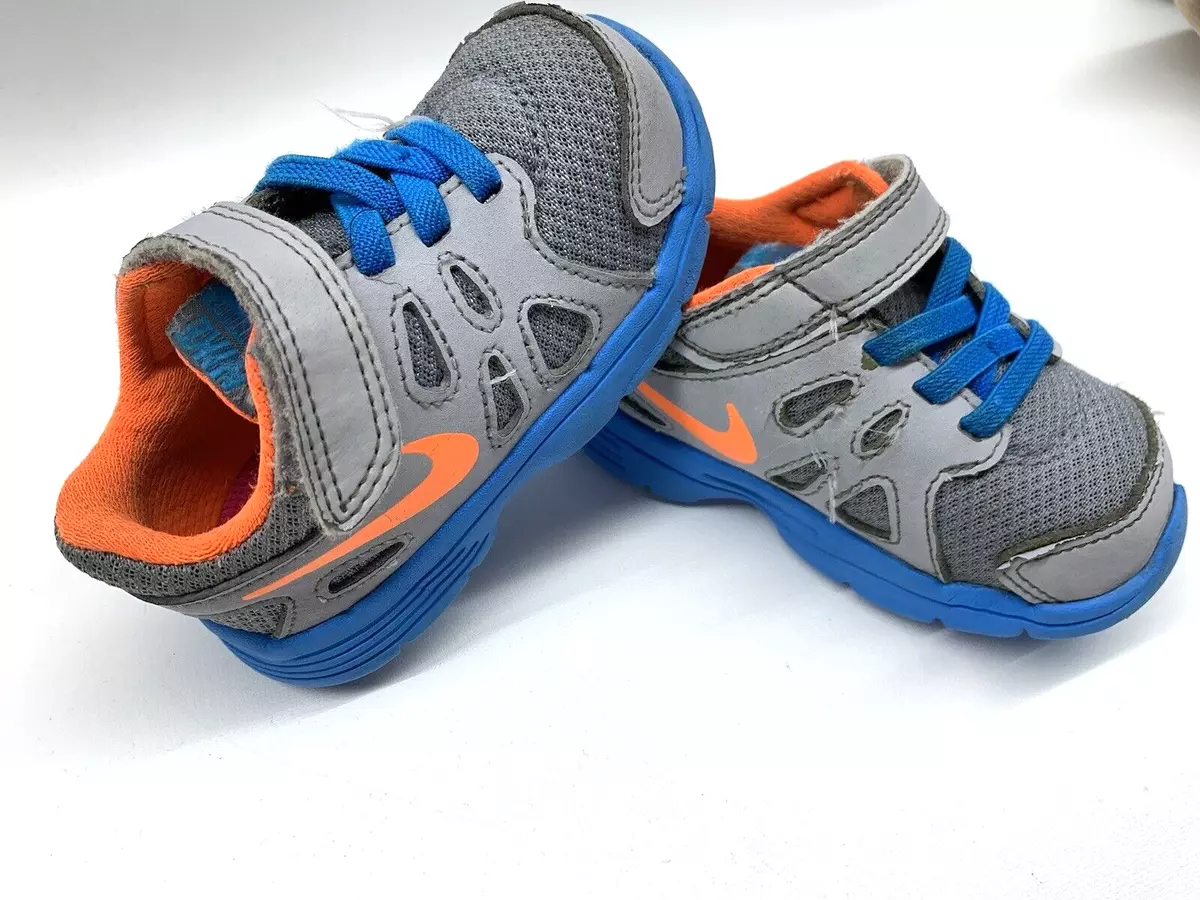 Toddler boys blue and orange nike revolution store