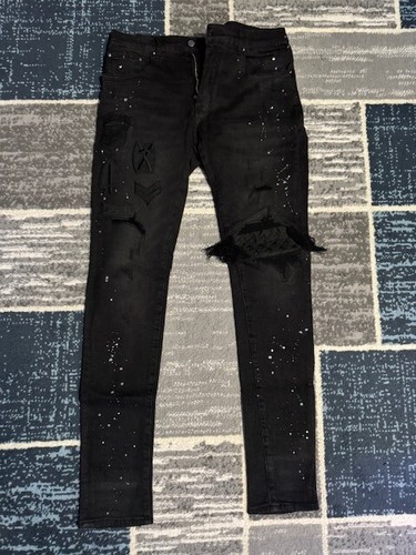 Amiri patch jeans - Gem Amiri patch jeans - Gem