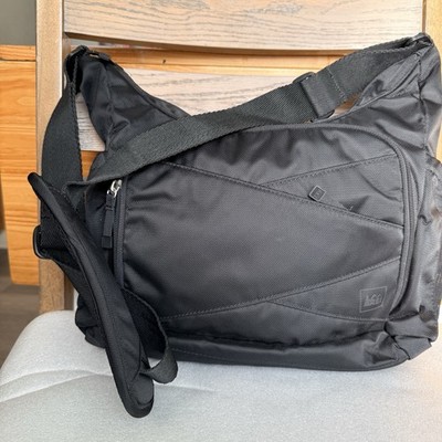 REI Co-op crossbody travel bag with organizational pockets blac