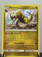 Haxorus 156/236 Unified Minds Reverse Holo Pokemon Card NM / Mint